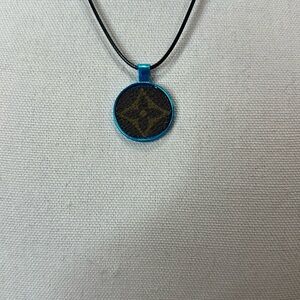 Necklace with upcycled Louis Vuitton monogram charm